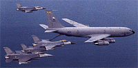 An KC-135 Stratotanker refueling a fighter jet.