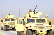 Alpha Company Soldiers pause in their Level II up-armored vehicles after finishing the first leg of the combat logistical patrol to the FOB. -- Click to Enlarge