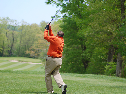 A golfer hits a beauty as he tees off at the Spring Meadow Golf Course near Farmingdale