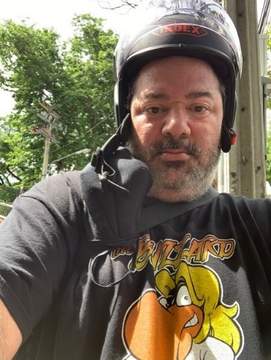 Location Scout Sam Hutchins takes time out for a selfie while scouting in Bangkok on his motorbike.