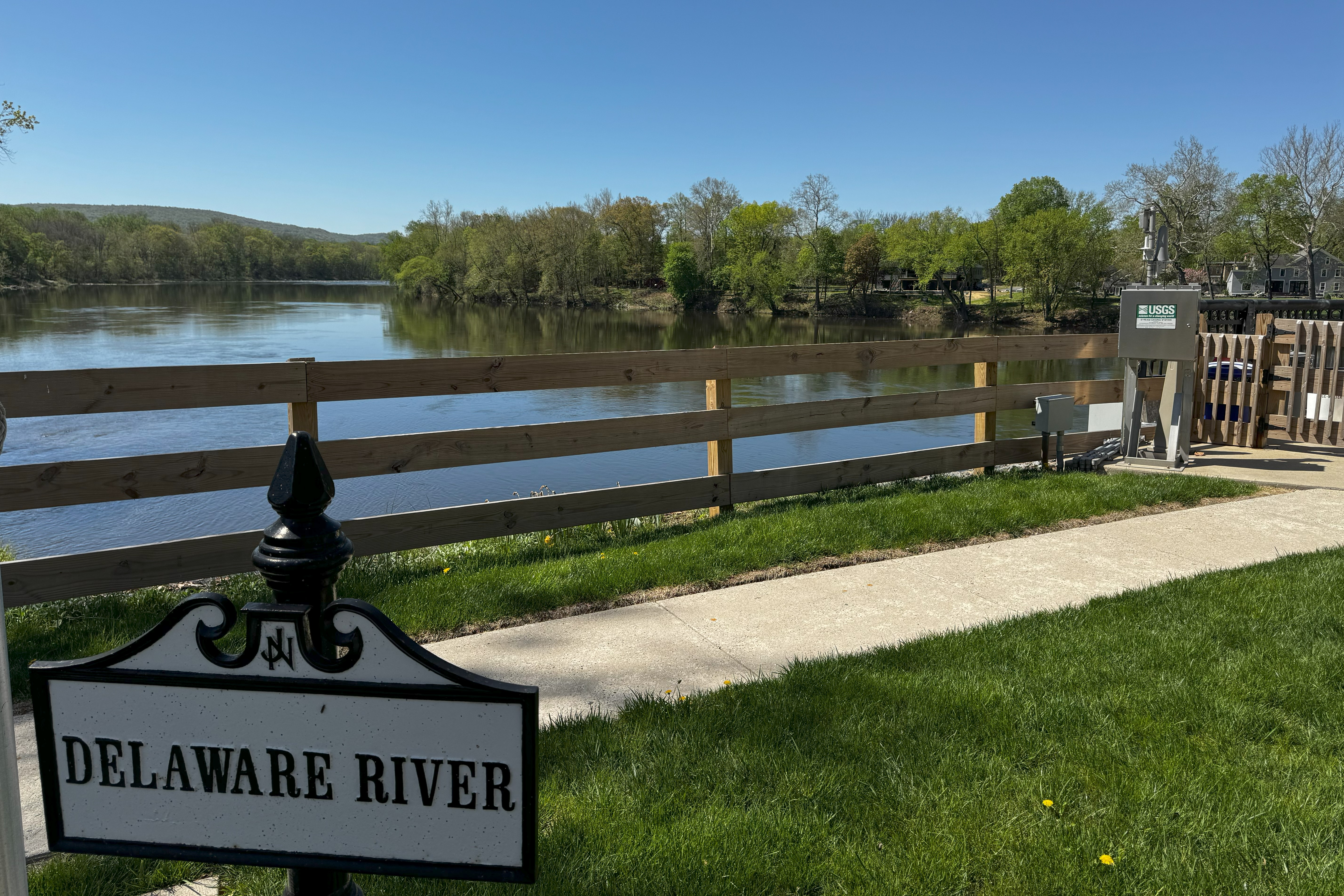 delaware river with sign