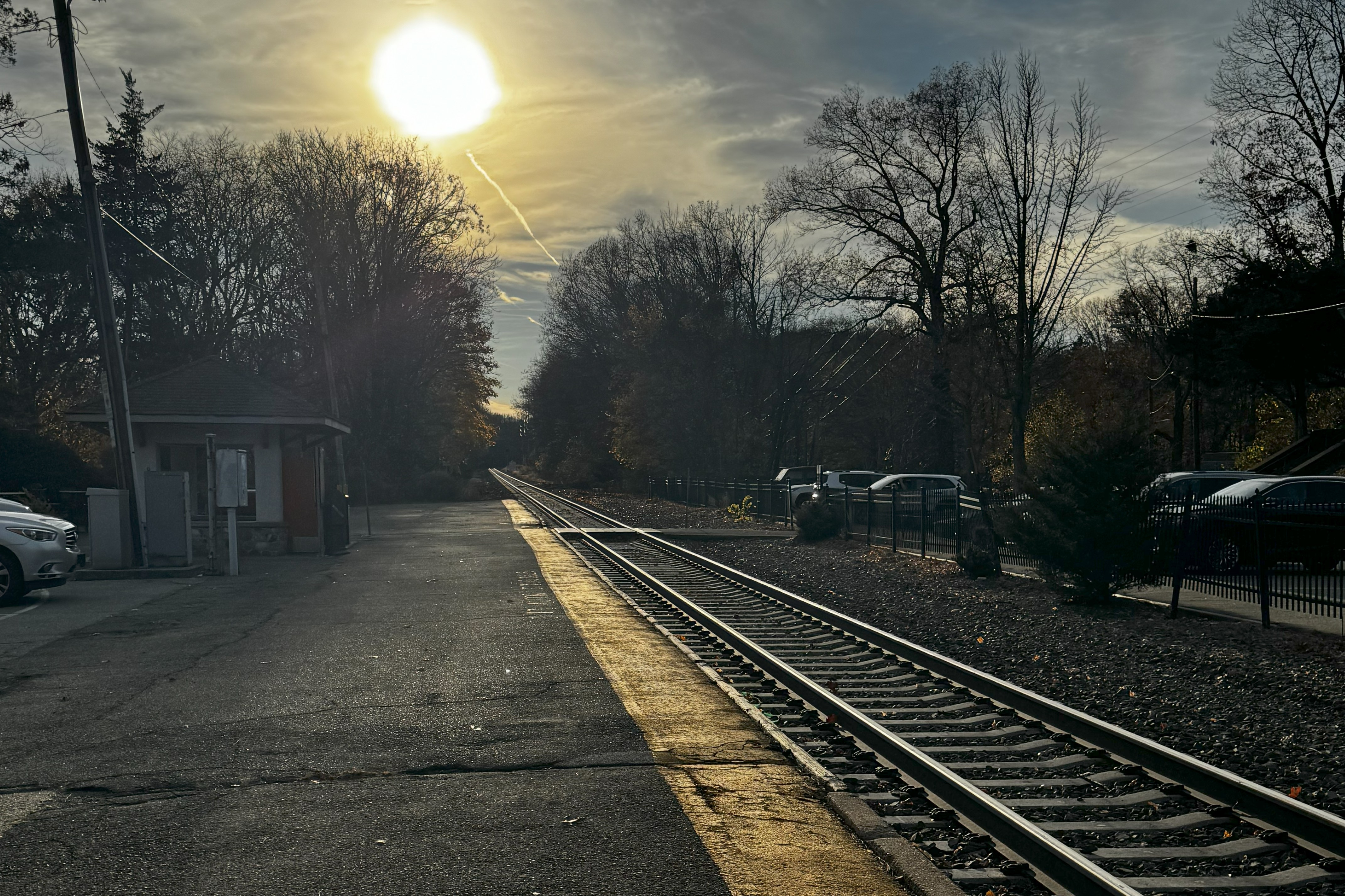 railroad tracks and sun