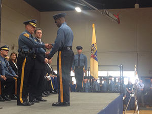 Recruit receiving the badge