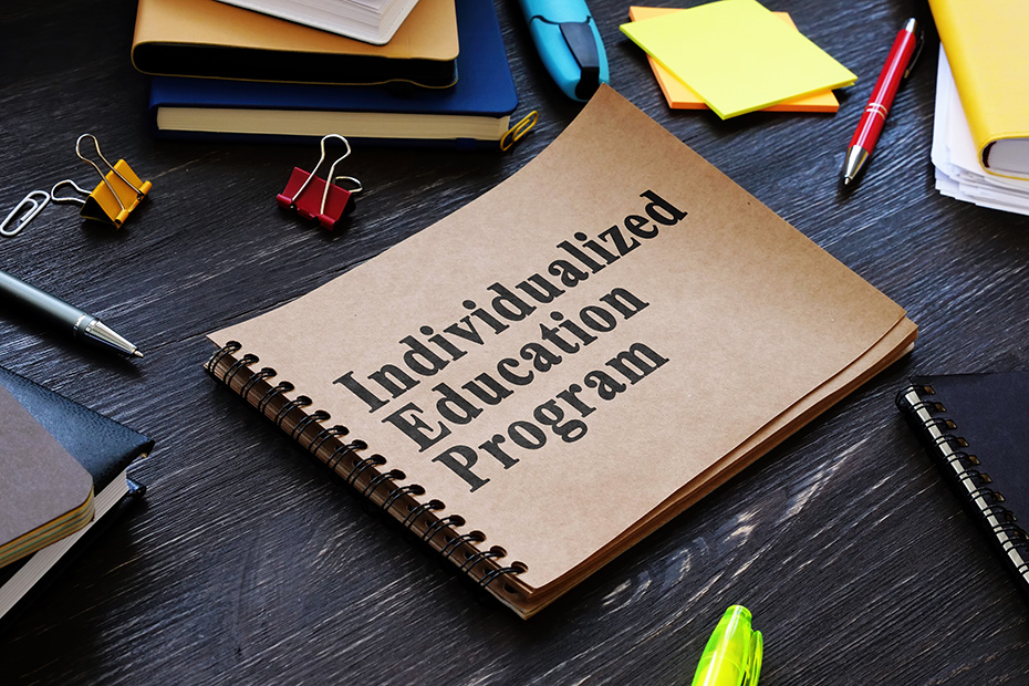Notebook with "Individualized Education Plan" on the cover
