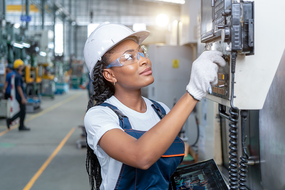 a woman working at an electrical box