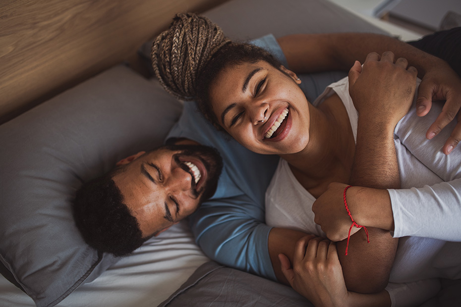 man and women laying on each other