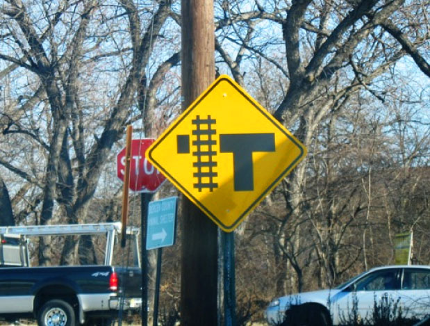 Yellow Diamond-Shaped ParallelTrack Sign