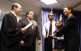 Paula T. Dow being  sworn in by Chief Justice Rabner