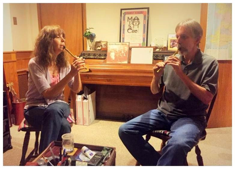 Master Traditional Irish Flute and Tin Whistle Player, Lesl Harker works with her Apprentice, John Emerich.
