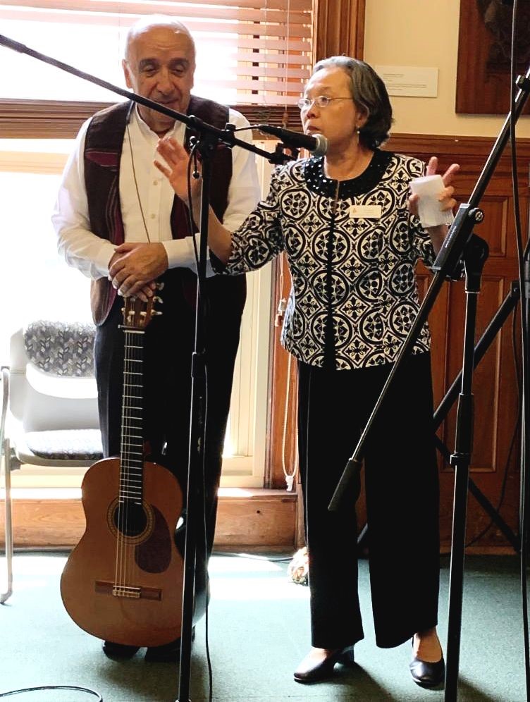 Juan Pepe Santana being introduced by Kim Nguyen, State Arts Council Folk Arts Program Officer.