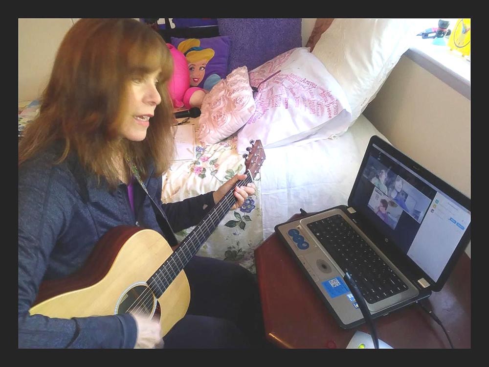 Homebound Folk Teaching Artist, Valerie Vaughn, in a Homebound session with program participants via ZOOM, Spring 2020.