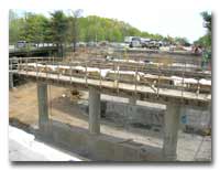 Railroad bridge work looking east photo