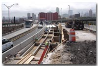 This is an aerial view from Palisade Avenue of ongoing construction work on the eastbound 12th Street Viaduct photo.