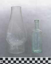 lamp chimney and medicine bottle photo